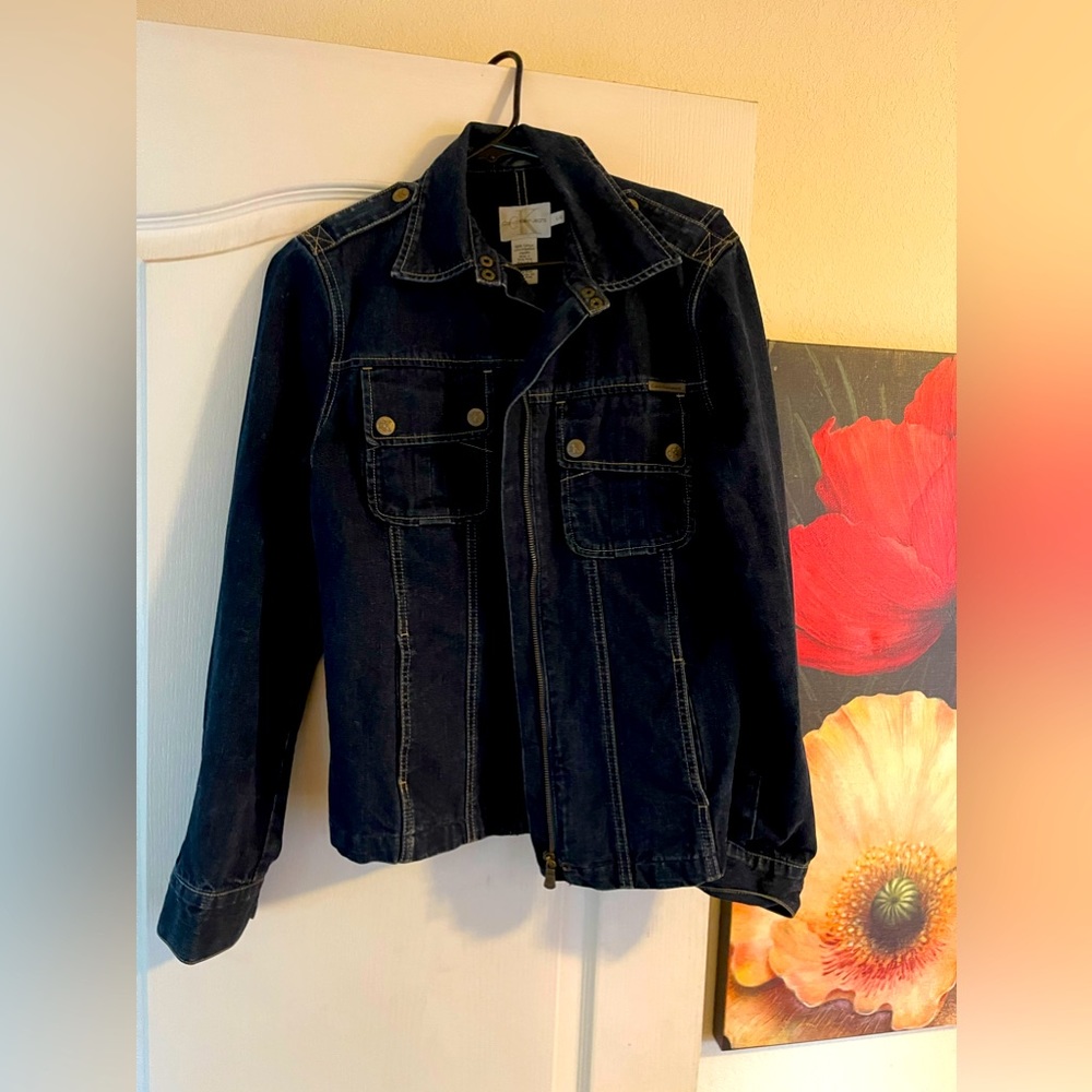 Calvin Klein jean jacket size large. Gently used. Dark blue.